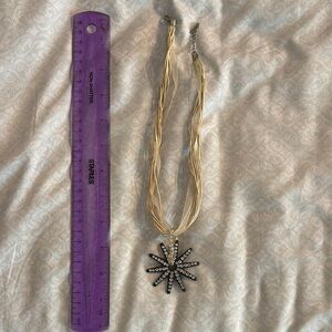 Elegant Gold and Silver Western Spur Necklace